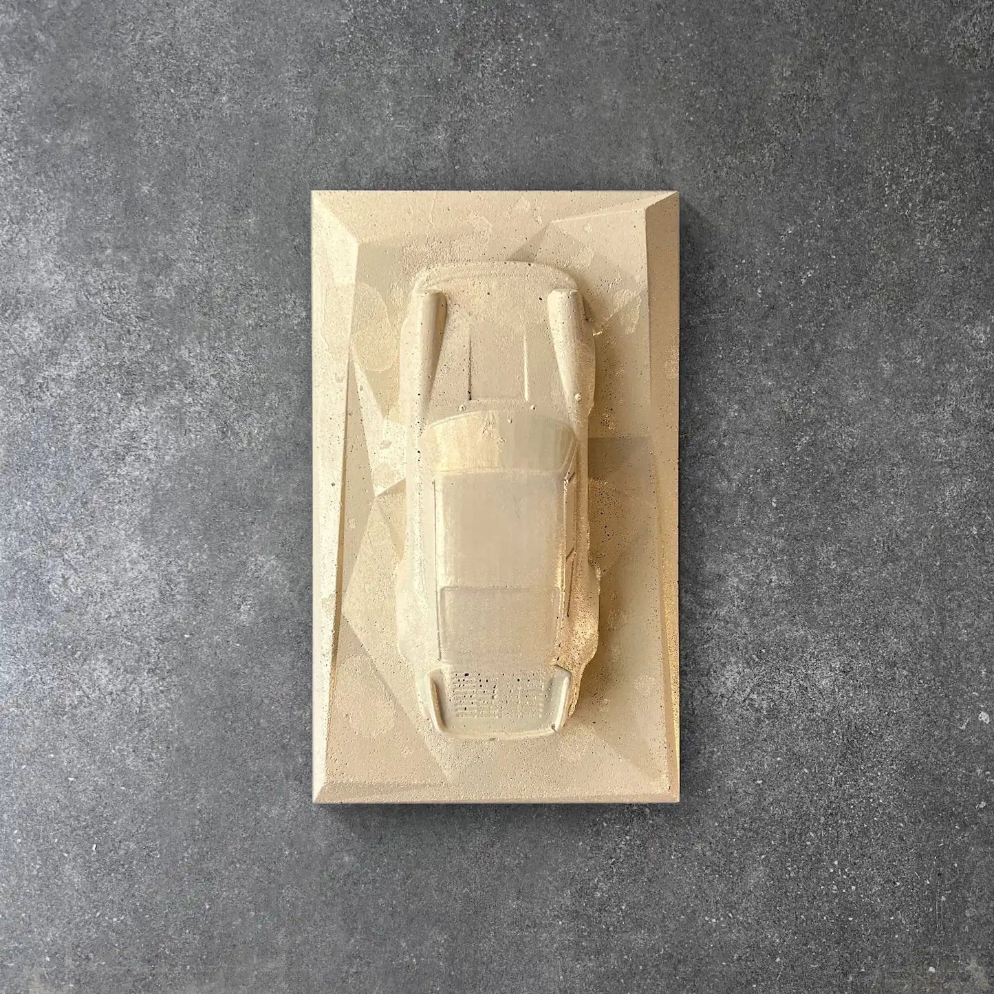 Porsche 930 concrete sculpture in sandstone minimal style – CarArt Dubai