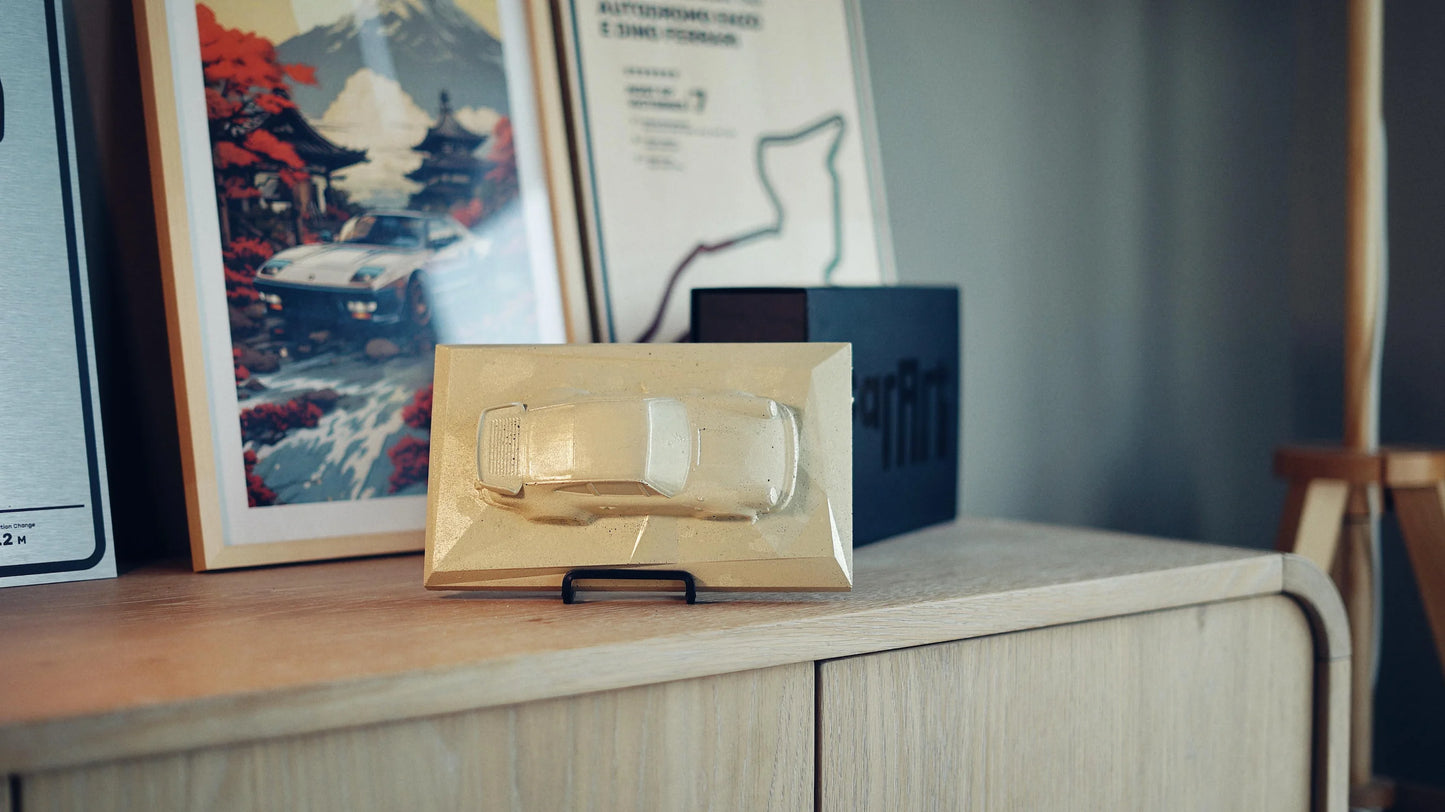 Porsche 930 concrete Sculpture art mockup in beige sandstone finish, landscape display by CarArt Dubai
