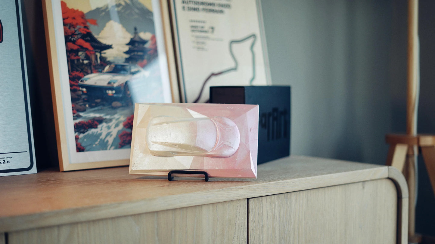 Lotus Emira concrete sculpture in pastel gradient design, landscape mockup – CarArt Dubai