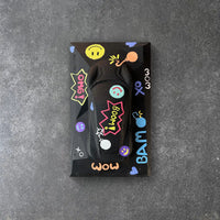 Lotus Emira concrete sculpture art in black pop art graffiti style with comic lettering and emojis by CarArt Dubai