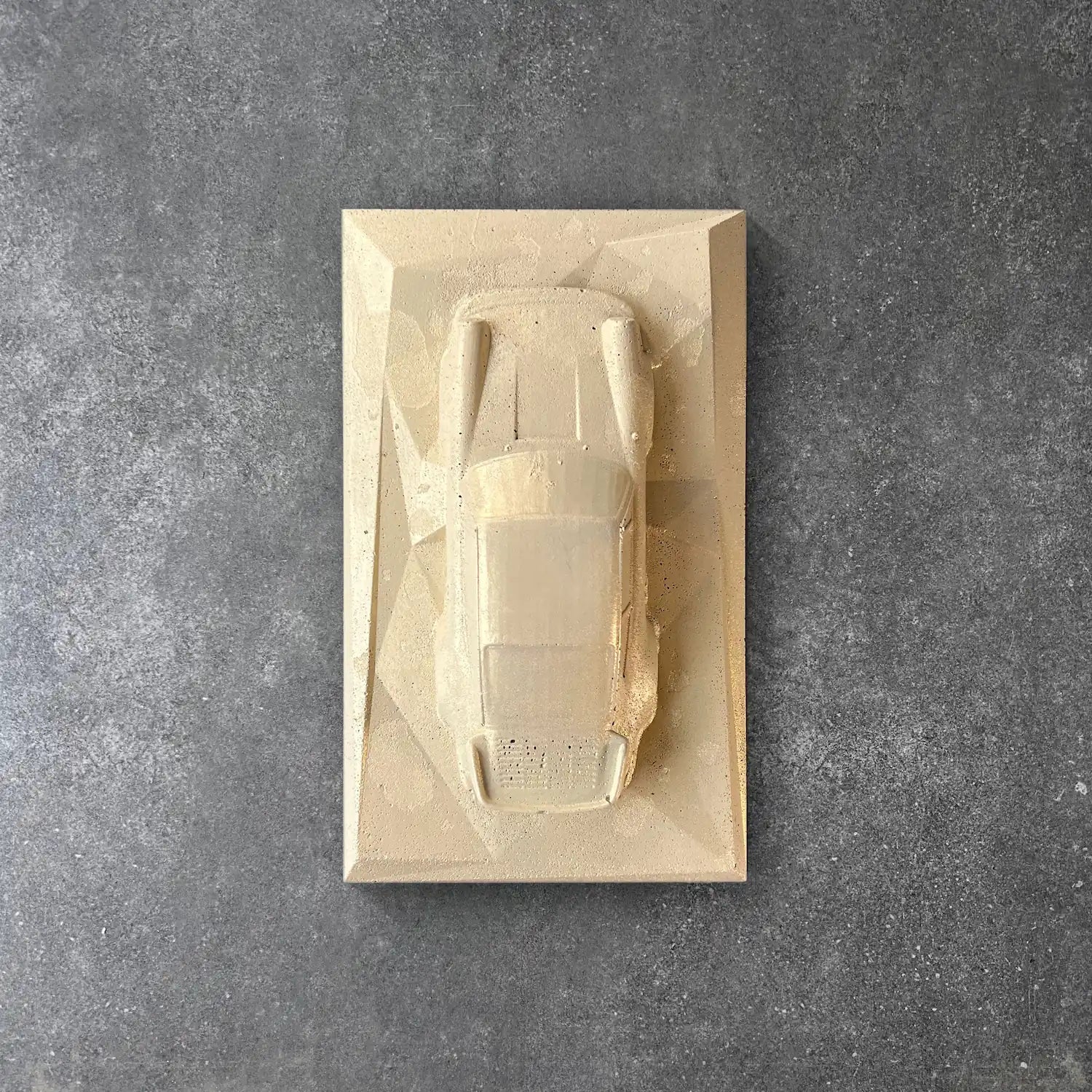 Porsche 930 concrete sculpture in sandstone minimal style – CarArt Dubai
