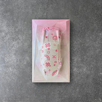 Concrete Porsche 930 sculpture with pink geometric pattern design – CarArt Dubai