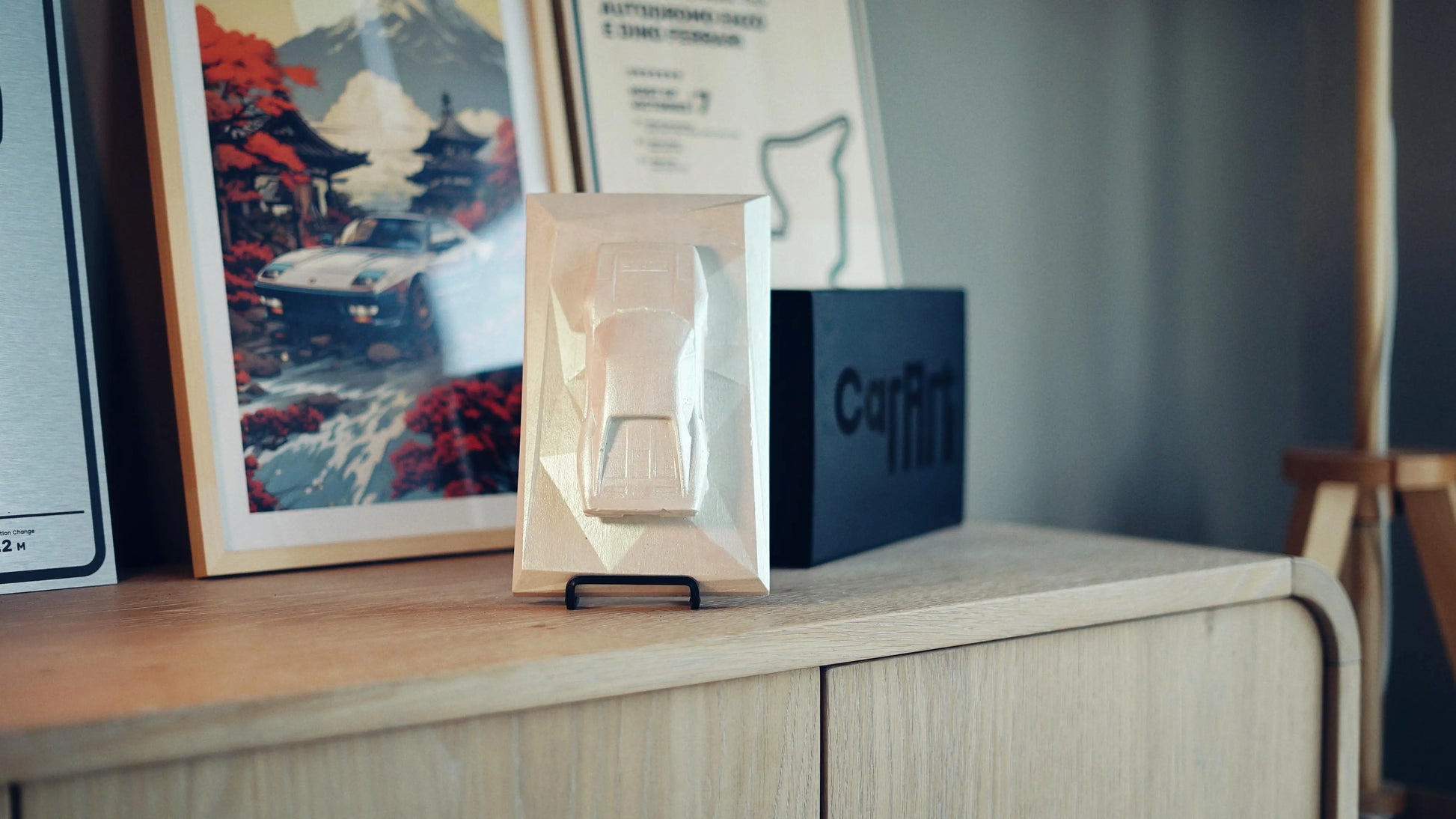 Ferrari 288 GTO concrete sculpture mockup in iridescent pearl shimmering finish, portrait display by CarArt Dubai