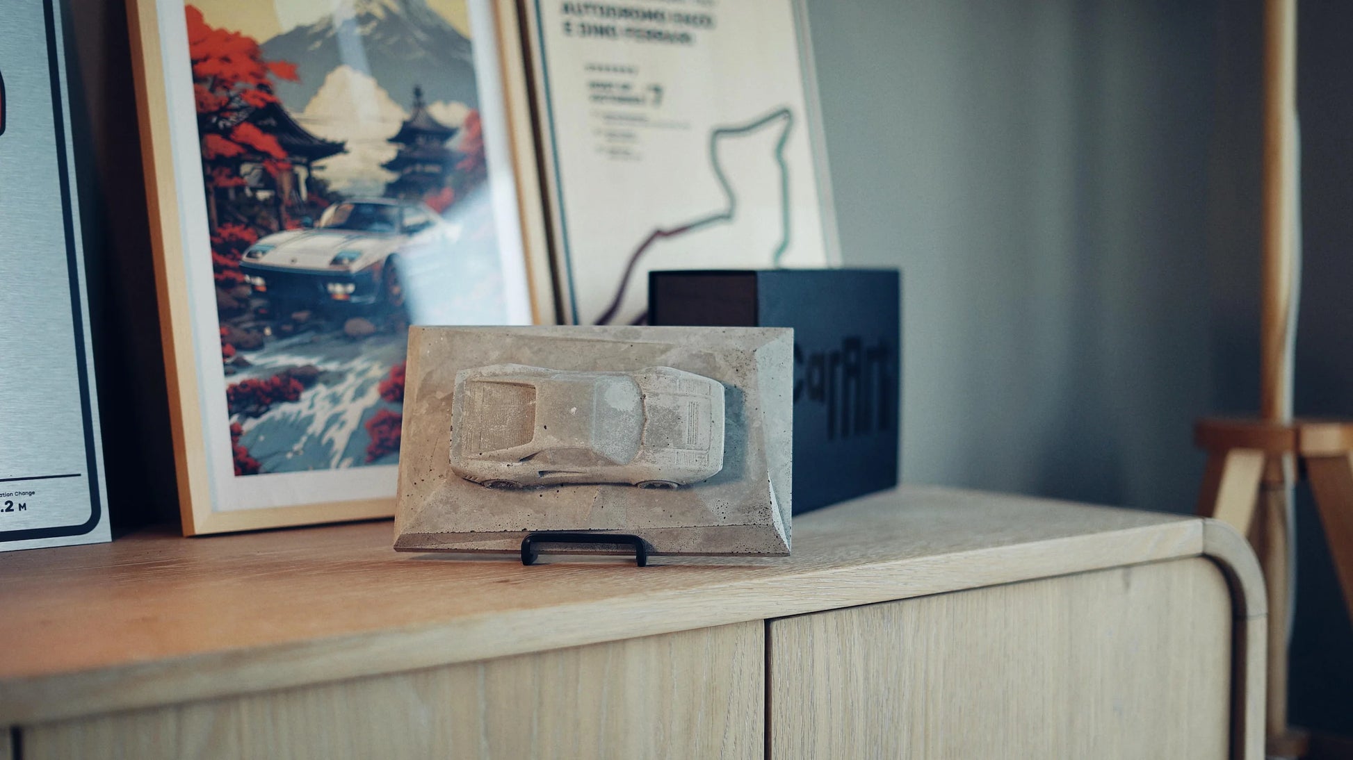 Ferrari 288 GTO concrete sculpture in raw concrete finish, landscape mockup – CarArt Dubai