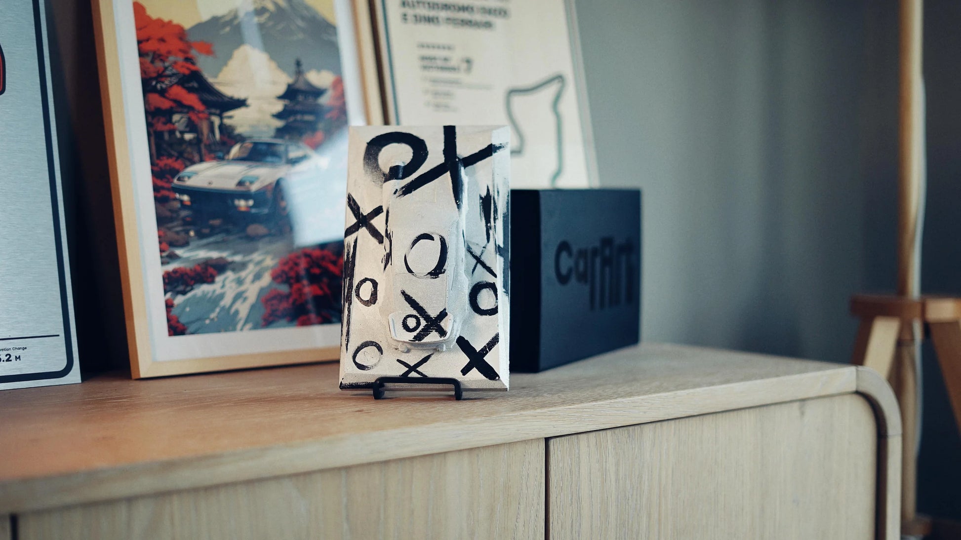 Porsche 930 concrete sculpture in black and white X/O style, portrait mockup – CarArt Dubai