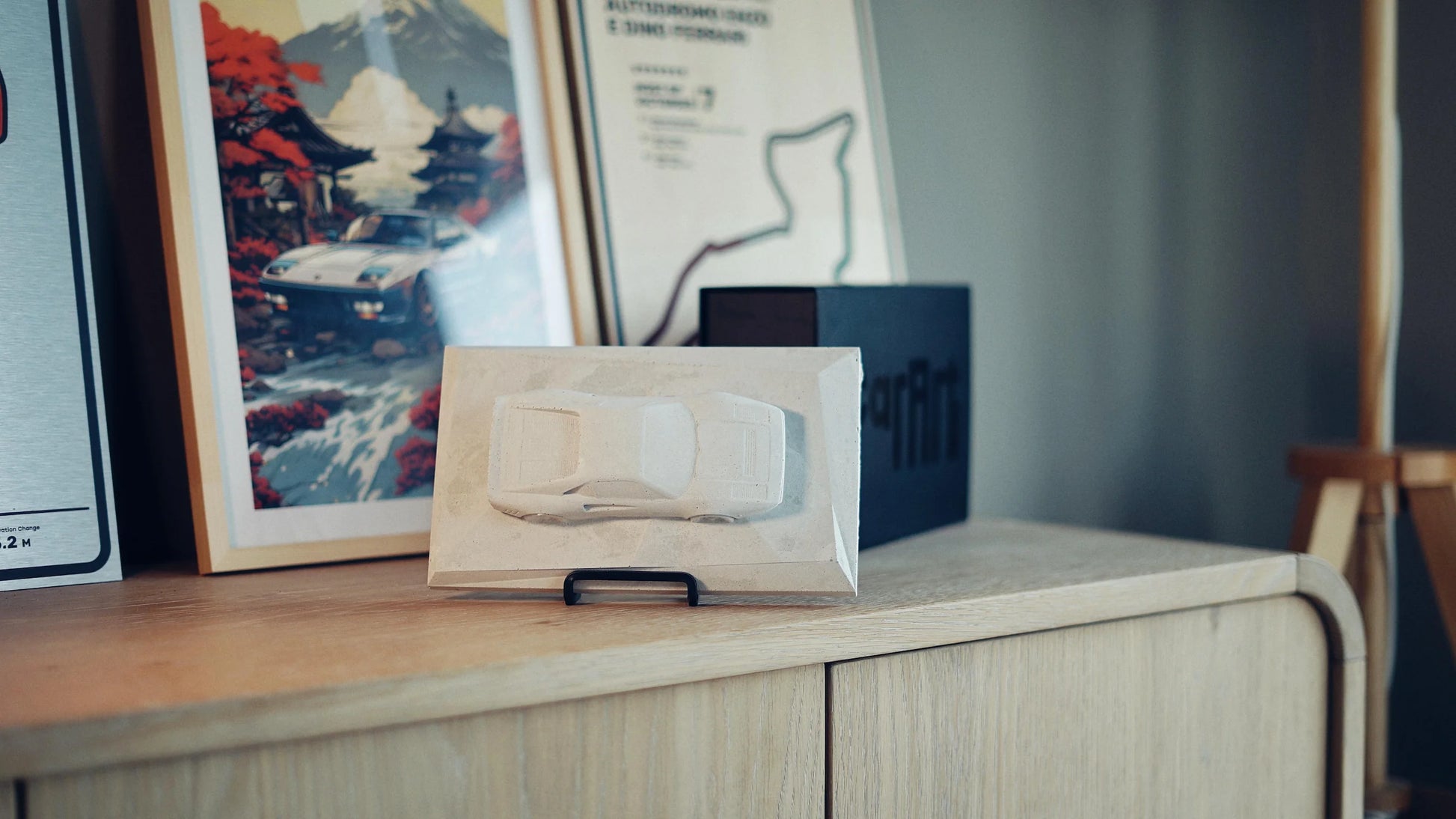 Ferrari 288 GTO concrete sculpture in light concrete finish, landscape mockup – CarArt Dubai