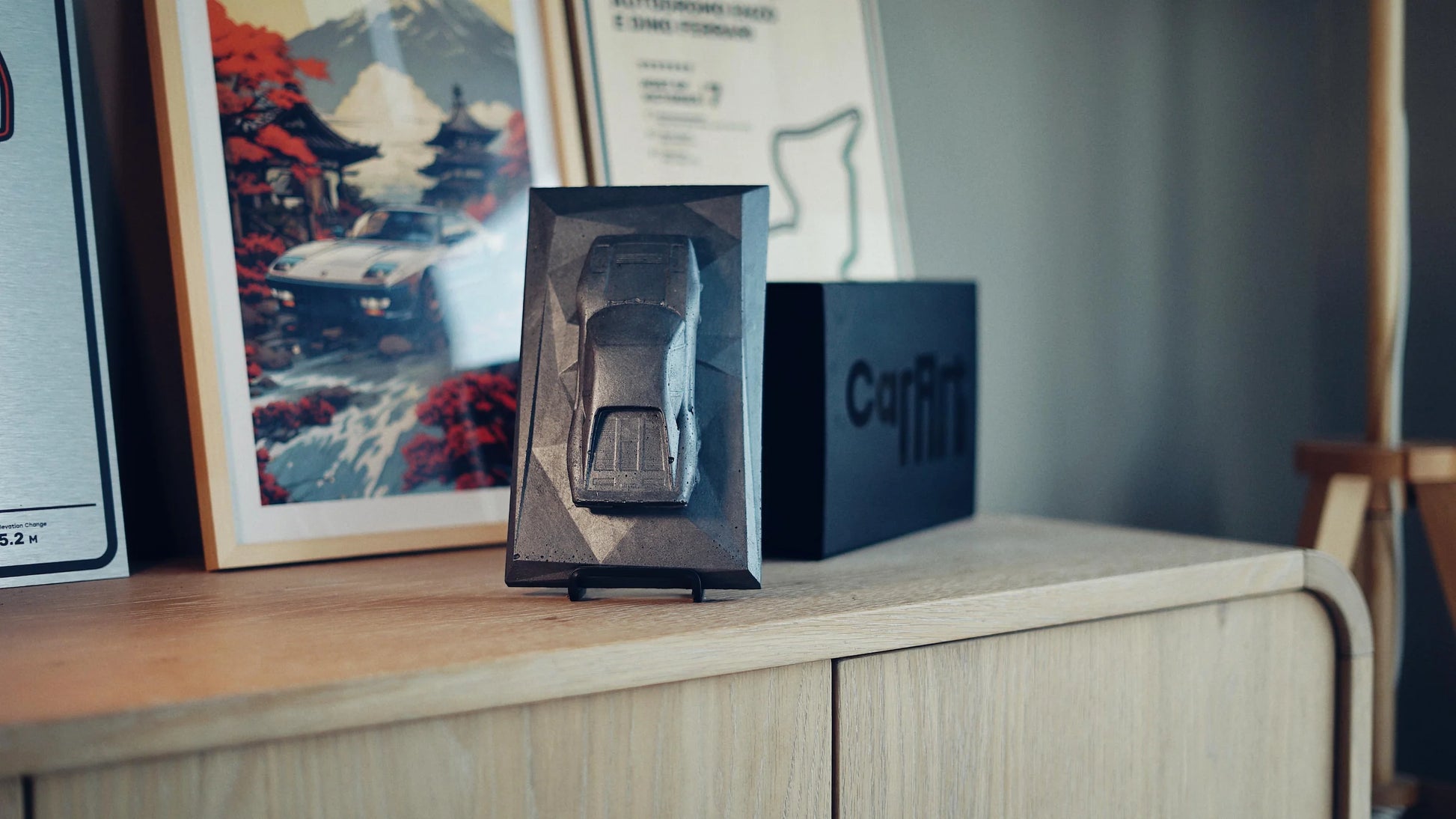 Ferrari 288 GTO concrete sculpture in dark concrete finish, portrait mockup – CarArt Dubai